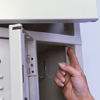 Upper box door of Two-Person Locker is opened from the inside of users wardrobe compartment